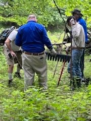 Various pictures of Wilderness Park getting cleaned up on June 9, 2024